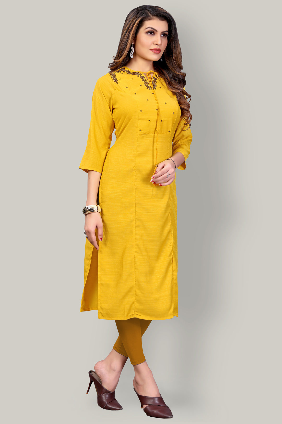 Buy Yellow Silk kurti with stylish handwork